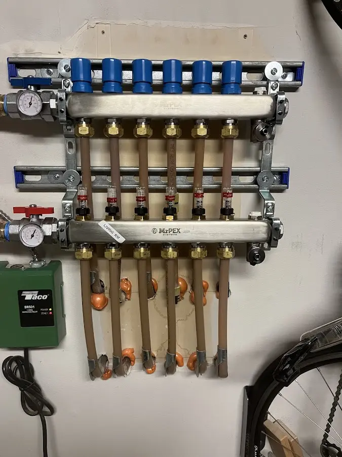 Plumber performing Gas Leak Detection at a residential property in Darien